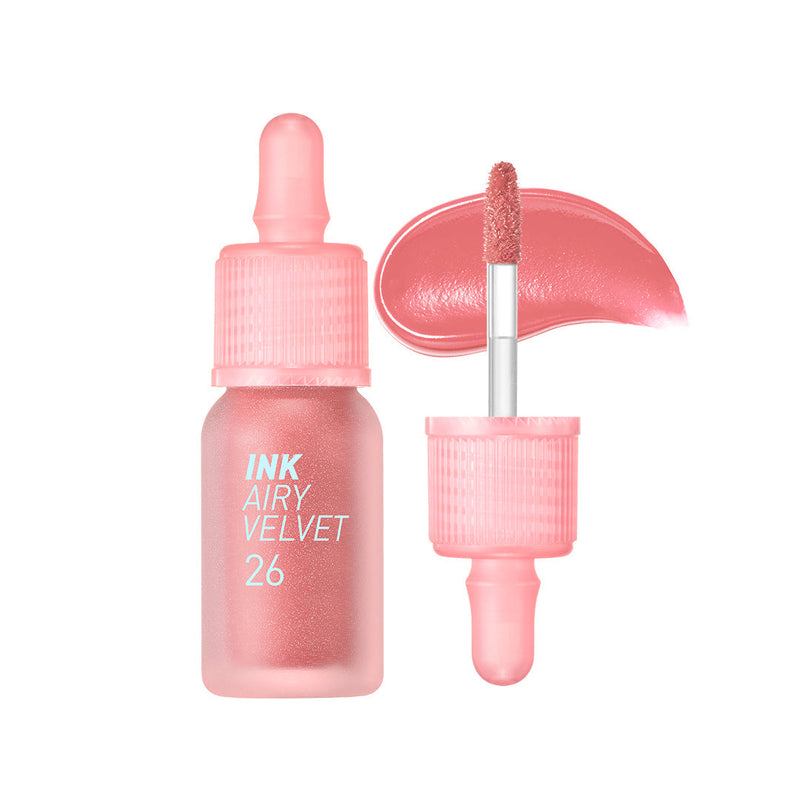 ProtoClinical k-beauty peripera Ink Airy Velvet 4g (NEW #26~#30) single coral-pink lip tint swatch in a rounded diamond shape with a darker center and pale blue side shading on a white background
