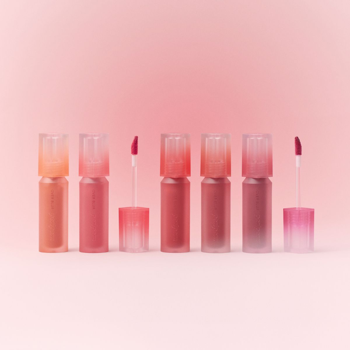 ProtoClinical k-beauty peripera Over Blur Tint 3.5g single rosy lip tint swatch with a soft blurred edge on a pale pink and beige background