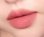 ProtoClinical k-beauty peripera Over Blur Tint 3.5g shade 02 Cool Starter shown as a single horizontal lip tint swatch on a pale beige background