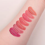 ProtoClinical k-beauty peripera Over Blur Tint 3.5g single coral-rose lip tint swatch with a soft blurred edge on a pale peach background