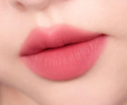 ProtoClinical k-beauty peripera Over Blur Tint 3.5g shade 03 Pink Check shown as a single horizontal pink lip tint swatch on a pale beige background