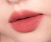 ProtoClinical k-beauty peripera Over Blur Tint 3.5g shade 05 Vintage Acorn shown as a single horizontal lip tint swatch on a pale beige background