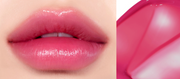 ProtoClinical k-beauty peripera PERIPERA Water Bare Tint single wide lip tint swatch in mauve-rose tones on a pale background