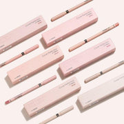 ProtoClinical k-beauty the SAEM Cover Perfection Lip Pencil 2g diagonal row of 10 slim beige lip pencils with matching pink and brown liner swatches on a white background