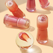 ProtoClinical k-beauty warm beige beauty product packaging on a light cream background.