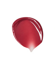 ProtoClinical k-beauty centered red beauty product on a clean white background with soft aqua corner accents.