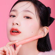 ProtoClinical k-beauty warm beige and brown beauty product packaging on a light background.