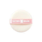 ProtoClinical k-beauty 16BRAND Blur Pact 8g #SKIN BEIGE round beige powder puff with a pink Sixteen Brand strap centered on a clean white background