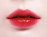 ProtoClinical k-beauty 16BRAND FRUIT-CHU COLLAGEN JELLY TINT (3colors) red lip color swatch centered horizontally on a white background with pale mint side accents