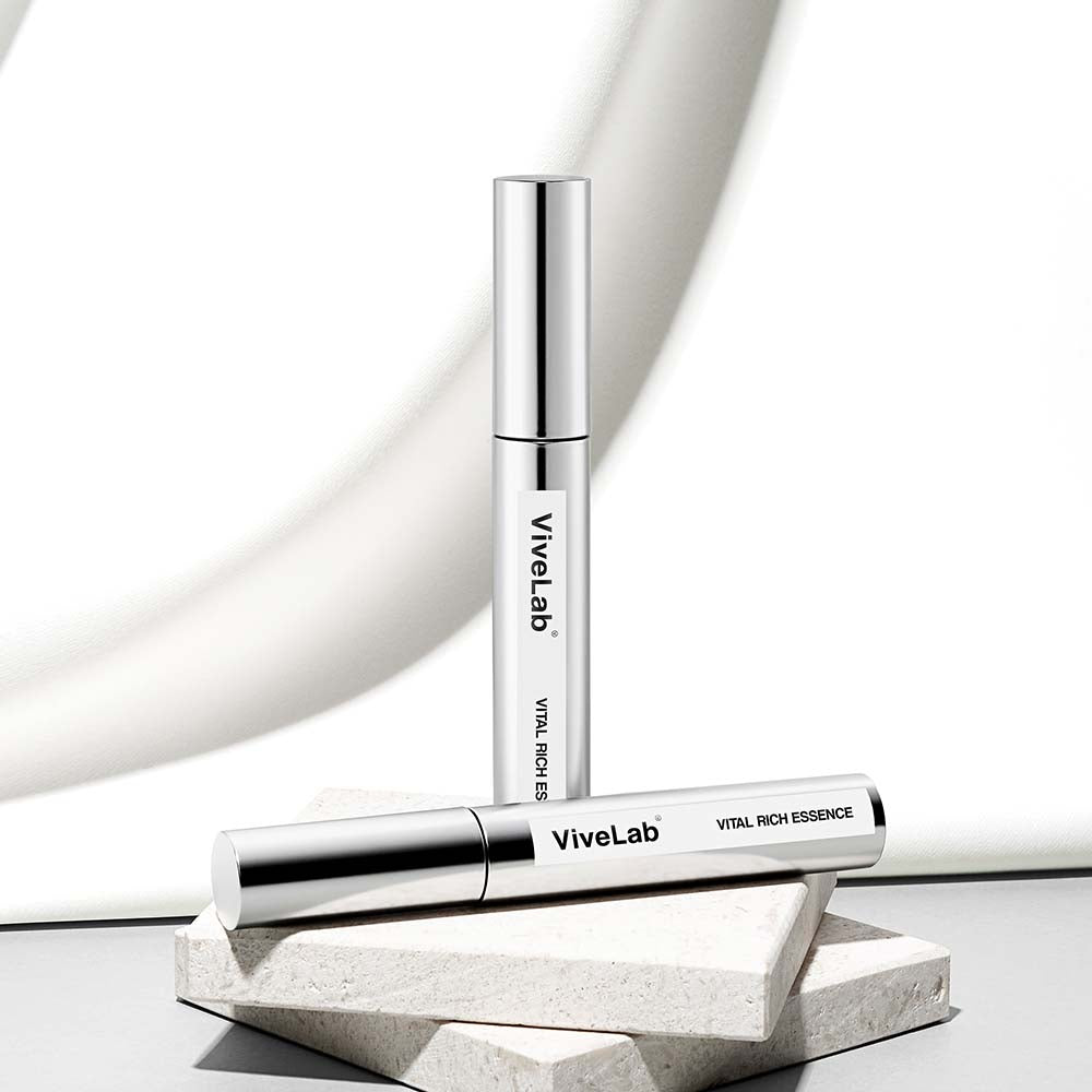 ProtoClinical k-beauty pale beige beauty packaging with soft gray lower accents on a light background.