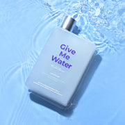 ProtoClinical k-beauty withbecon GiveMeWater Shampoo 360ml single upright blue package centered on a pale blue background with darker blue shading near the base