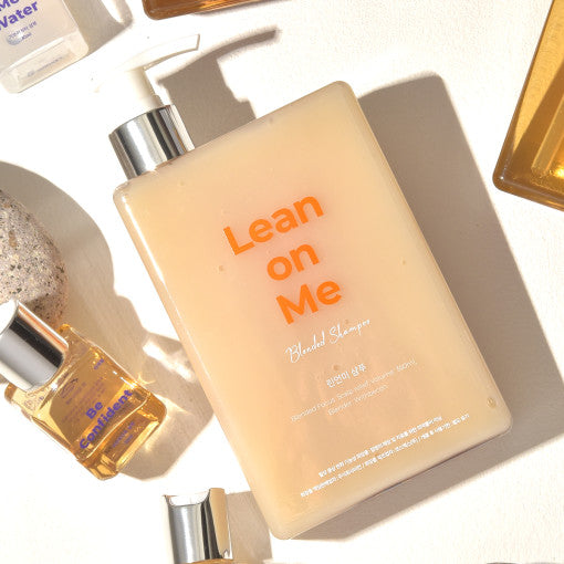 ProtoClinical k-beauty withbecon LeanOnMe Shampoo 360ml single warm peach package centered on a pale blue background
