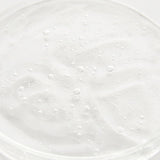 ProtoClinical k-beauty warm amber beauty graphic with a dark horizontal band on a golden background.