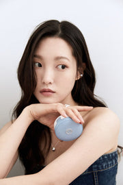 ProtoClinical k-beauty beige and orange beauty product on a clean white background.