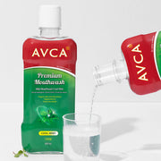 ProtoClinical k-beauty AVCA Mild Mouthwash Cool Mint 800ml single tall dark green mouthwash bottle centered on a pale pink, mint, and light blue background