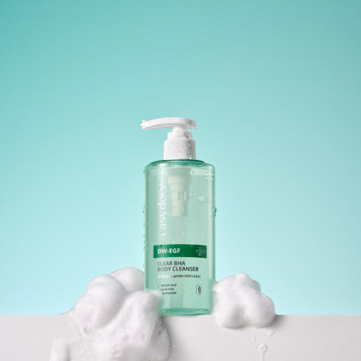 ProtoClinical k-beauty aqua beauty packaging silhouette with soft peach accents on a light background.