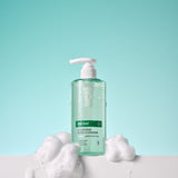 ProtoClinical k-beauty aqua beauty packaging silhouette with soft peach accents on a light background.