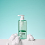 ProtoClinical k-beauty aqua beauty packaging silhouette with soft peach accents on a light background.