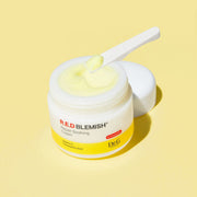 ProtoClinical k-beauty pale yellow beauty packaging with a warm beige center on a light background.