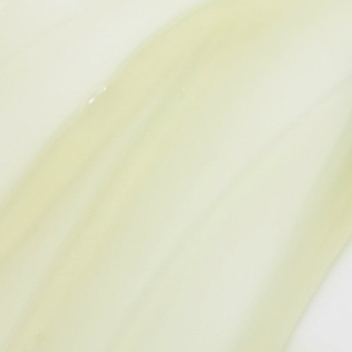 ProtoClinical k-beauty One-day's you Cica:ming Lip Balm 10ml close-up of a glossy pale yellow balm swatch spread diagonally on a clean white background