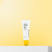 ProtoClinical k-beauty One-day's you Vita-C Lip Balm 10ml single upright lip balm tube centered on a pale background