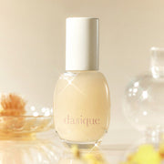 ProtoClinical k-beauty warm beige beauty graphic with soft peach lower tones on a light background.