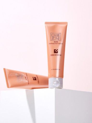 CAREZONE Acne Clarifying Foam Cleanser Duo Set (130ml+130ml) by ProtoClinical shown with two warm-toned cleanser tubes on a light background for a k-beauty skincare routine.