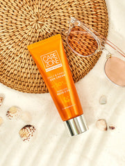 ProtoClinical k-beauty CAREZONE Daily & Family Sun Cream 80ml (SPF50+/PA+++) single upright orange package centered on a white background with pale blue corner accents