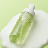 ProtoClinical k-beauty pale cream beauty graphic with muted green and beige tones on a light background.