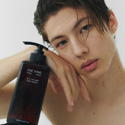 ProtoClinical k-beauty brown beauty bottle silhouette with pale mint accents on a light background.