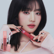 ProtoClinical k-beauty 3CE Blur Water Tint 4.6g single upright rose lip tint tube centered on a pale background with soft blue side bands