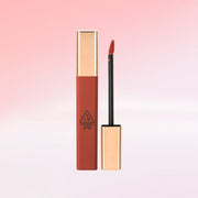 ProtoClinical k-beauty 3CE CLOUD LIP TINT 4g single upright lip tint tube centered on a soft pink background with pale gray side shading