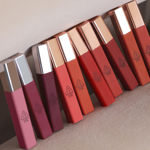 ProtoClinical k-beauty 3CE CLOUD LIP TINT 4g horizontal deep red lip tint swatch across a pale pink background