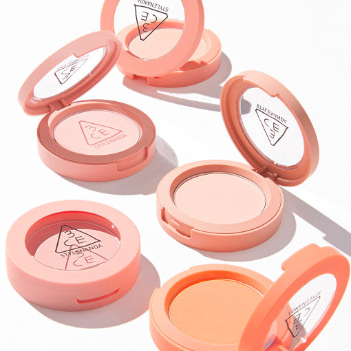 ProtoClinical k-beauty 3CE Face Blush 5g-5.5g single blush compact package in warm peach tones centered on a clean white background