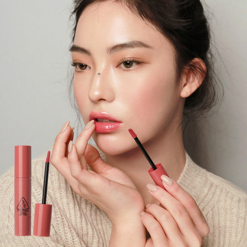 ProtoClinical k-beauty 3CE GLAZE LIP TINT 5g single upright peach-beige cosmetic container with a pale aqua cap on a light background