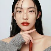 ProtoClinical k-beauty 3CE GLAZE LIP TINT 5g single lip tint package centered in a product packshot on a clean white background