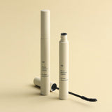 ProtoClinical k-beauty 3CE SLIM FIX WATERPROOF MASCARA 6.5g single slim mascara tube centered on a pale yellow background with soft horizontal bands