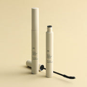ProtoClinical k-beauty 3CE SLIM FIX WATERPROOF MASCARA 6.5g single slim mascara tube centered on a pale yellow background with soft horizontal bands