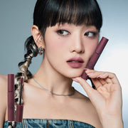 ProtoClinical k-beauty 3CE Velvet Lip Tint 4g multiple lip tint tubes and matching cartons arranged in rows on a white background