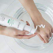 ProtoClinical k-beauty make p:rem Safe Me. Relief Moisture Cleansing Milk 200ml close product detail image showing the cleansing milk bottle with a visible packaging label on a light background