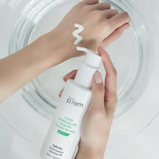 ProtoClinical k-beauty make p:rem Safe Me. Relief Moisture Cleansing Milk 500ml beige product packaging with a soft vertical silhouette on a light background