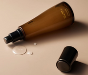 ProtoClinical k-beauty warm brown beauty detail image on a soft peach background.