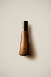 ProtoClinical k-beauty warm beige beauty product centered on a soft pale blue and white background.