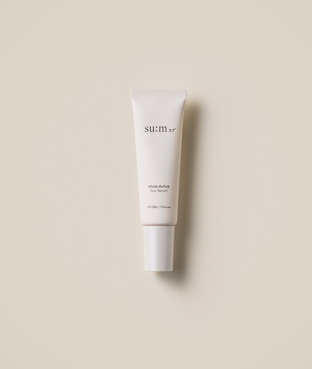 ProtoClinical k-beauty beige beauty product display on a light neutral background.