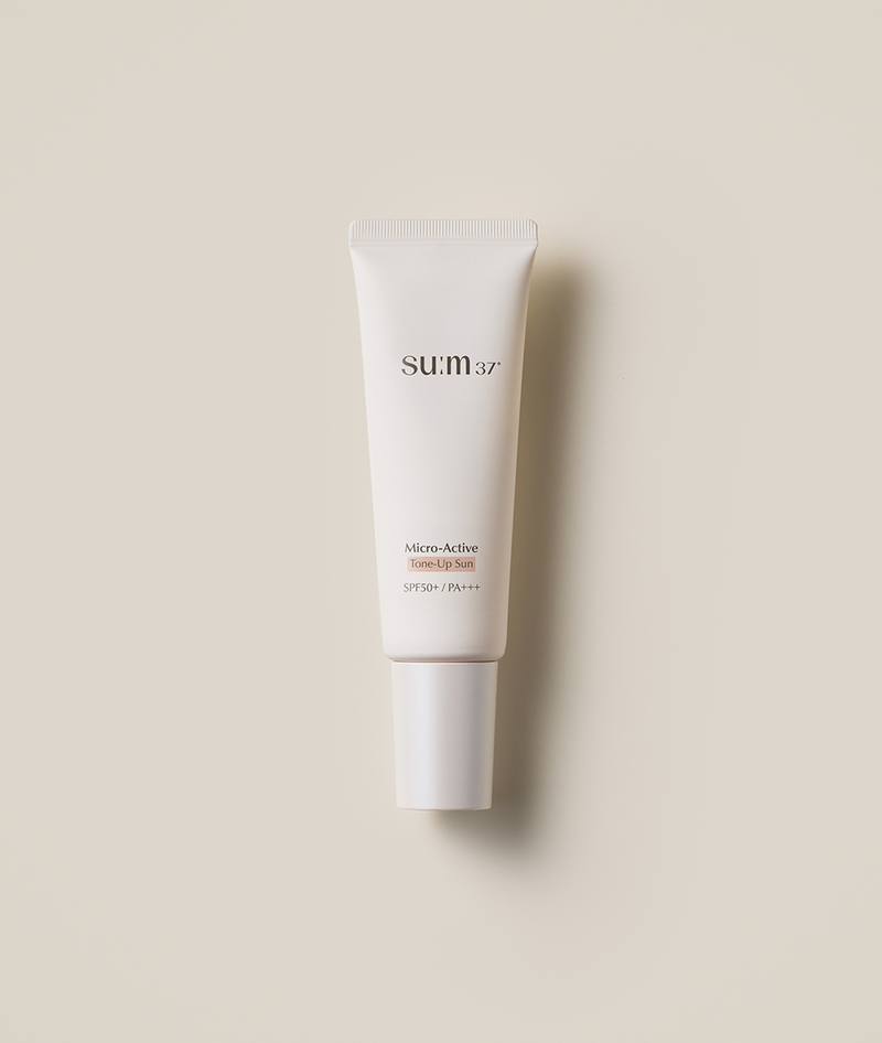 su:m37 Micro-Active Tone-up Sun SPF50+/PA+++ 50ml by ProtoClinical shown in a centered k-beauty sunscreen product display on a light neutral background.