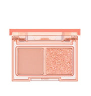 ProtoClinical k-beauty lilybyred Little Bitty Moment Shadow Palette open two-pan eyeshadow compact with a coral case, soft nude matte shade, and shimmering peach glitter shade