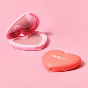 ProtoClinical k-beauty lilybyred LUV BEAM CHEEK 4.7g single square blush compact with two rosy pans on a soft pink background.