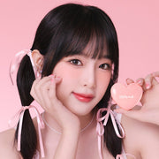 ProtoClinical k-beauty lilybyred Luv Beam Cheek Balm 3.5g single vertical pink balm container with a dark plum top on a soft pink background.
