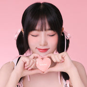 ProtoClinical k-beauty lilybyred Luv Beam Cheek Balm 3.5g single vertical rose-pink balm container with a dark plum top on a soft pink background.