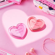 ProtoClinical k-beauty cosmetic packaging detail in soft pink tones on a light background.